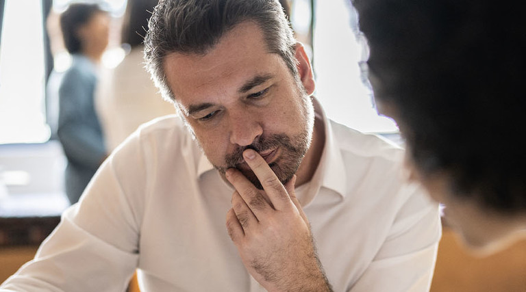 Person looking at a digital tablet