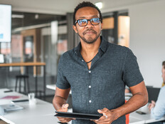 Person using tablet in meeting